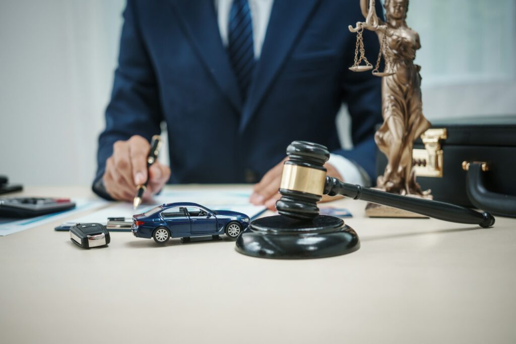 A lawyer specializes in auto auctions and legal matters, navigating vehicle accidents, insurance